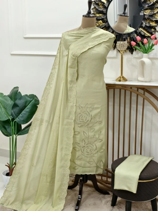 Stitched cutwork Punjabi suit in Pista Green with rose embroidered dupatta